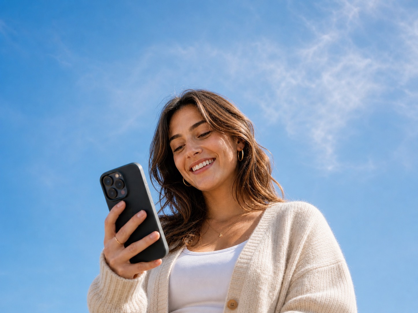 Woman smiling outdoors